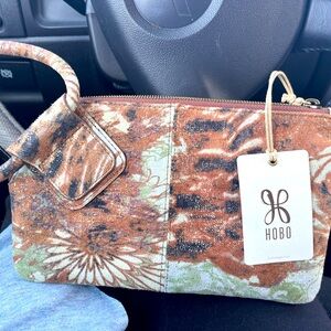 Brand new! HOBO Coastal Canyon Leather Wristlet